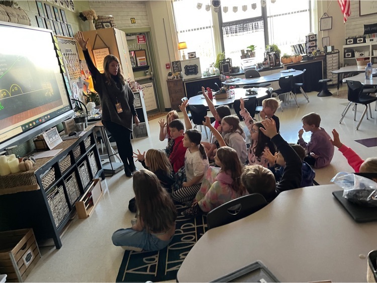 learning adding on with ten in Mrs. Erickson’s class
