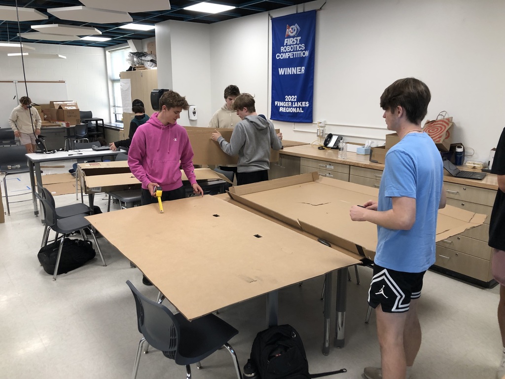 Transportation Systems Class getting ready for Cardboard Boat Races in the pool. Putting Archimedes Principle to work. 